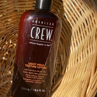 Pour cheveux Light hold texture lotion crème coiffante American crew